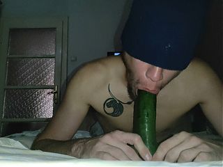 Deep sucking a huge cucumber